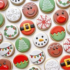 some decorated cookies are sitting on a table