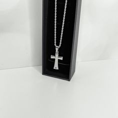 Express your faith with this beautiful stainless steel cross necklace. This highly polished piece is the perfect necklace for everyday wear, whether you're dressing up or down. Its rope chain and secure clasp make it so comfortable, you'll forget you're wearing it! Product details - Material: Stainless Steel - Chain: about 19.9 inch(50.5cm) long, 2.5mm thick, lobster clasp - Pendant: 35x17x3mm Stainless Steel Cross Pendant Necklace For Faith, Stainless Steel Crucifix Necklace With Adjustable Chain, Stainless Steel Cross Necklace With Adjustable Chain, Everyday Silver Cross Pendant Necklace, Stainless Steel Cross Pendant Necklace For Gift, Silver Crucifix Cross Necklace For Everyday, Stainless Steel Crucifix Cross Necklace As Gift, Gift Stainless Steel Cross Pendant Necklace, Minimalist Stainless Steel Cross Necklace With Adjustable Chain