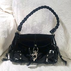 Nwot Francesco Biasia Shoulder Bag Black Leather Braided Shoulder Strap Dual Exterior Pockets Logo Jacquard Lining & Single Interior Pocket Clasp Closure At Front Stamped Silver Hardware Shoulder Strap Drop: 7" Height: 9" Width: 14" Depth: 5.5" Evening Shoulder Bag With Silver Accents, Chic Black Bags With Silver Accents, Elegant Shoulder Bag With Silver Accents, Elegant Shoulder Bag With Silver Accents For Everyday, Black Shoulder Bag With Silver Accents For Everyday Use, Black Bag With Silver Accents For Formal Occasions, Black Formal Bag With Silver Accents, Black Bags With Silver Accents For Formal Occasions, Formal Black Bag With Silver Accents