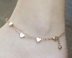 "Cute Hearts Double-Chain Charm Anklet for Girls, Teens and Women.   ♡ All you need is love! Love is all you need ♡   We believe in love. Our heart jewelry collection is a perfect way to help express your love to others. Hearts, the beautiful, classic symbol of love, make unique thoughtful gifts that show your loved ones how much you care for them.   This adjustable anklet, made of stainless steel and plated with 18K rose gold, features 7 cute heart charm pendants on a double chain.   An anklet Heart-shaped Metal Anklets For Gift, Heart-shaped Metal Anklets As Gift, Gold Heart Anklets, Summer Sandals Heels, Cute Anklets, Light Summer Dresses, Cute Hearts, Charm Anklet, Leg Chain