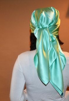 Alessia silk head wrap is a beautiful sea foam green charmeuse silk sleep scarf which will protect your hair from frizz and retain its moisture while you sleep. Swap out your traditional bonnet for a chic silk sleep scarf. Silk scarves will protect your hair from the friction of a cotton pillowcase, which can cause damage to your beloved tresses! Fabric Fun Facts !   Silk Benefits: 1. Silk has a natural protein structure and is the most hypoallergenic of all fabrics 2. Silk is an all-climate fabric making it suitable for the any season 3. Sleeping on silk will preserve your hairstyles longer and prevent frizz 4. Sericin  proteins in silk protects delicate hair  5. Silk is a lightweight and breathable fabric 6. Gentle material soothes skin and prevents irritation of sensitive skin  Details: Silk Scarf Head Wrap, Sleep Scarf, Silk Headwrap, Scarf Head Wraps, Mulberry Scarf, Protein Structure, Silk Hair Wrap, Bandana Silk, Silk Benefits