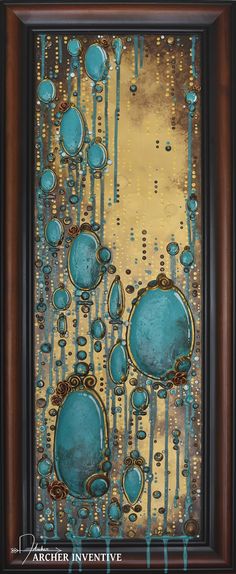 an abstract painting with blue and gold paint on the bottom, in a brown frame