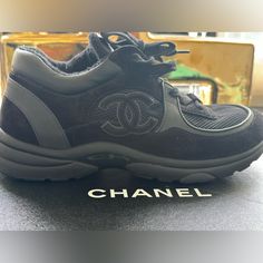 Used Women Chanel Trainers Suede Black Sneakers For Streetwear, Stylish Black Sneakers For Streetwear, Elegant Black Round Toe Sneakers, Black Leather Evening Sneakers, Evening Black Leather Sneakers, Elegant Black Evening Sneakers, Chic Black Leather Sneakers, Chanel Runners, Chanel Trainers