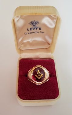 A PERFECT GIFT! Size 9 Masonic Ring in 10k yellow gold with inset lab ruby stone ~ This simple vintage style is hard to find. Red stone represents Red Lodges in some areas and to some brothers, the fourth degree in Freemasonry – Royal Arch Masonry. Original ring box is included. Ring weighs 5 grams, has no scratches or dings. Has small spot of patina wear on the inside. Ring will be insured when shipped for buyers security. NOW priced well below gold value, definitely a generational heirloom piece! Vintage Masonic Jewelry, Simple Vintage Style, Masonic Ring, Ruby Stone, Red Stone, Ring Box, Patina, Vintage Style, Jewelry Watches