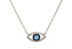 Chain Length: 16" + 2" extension Pendant Size: 1" cm length Stones: Cubic Zirconia Material: 18K Gold plated on Sterling Silver ARIES is a best seller! This stunning piece is perfect for any occasion and completes any look! The purpose of the evil eye is to protect the wearer from evil and ward off the evil that has been directed at them. The evil eye is used across many cultures all over the world. Turquoise Diamond Pendant Necklace, Blue Sterling Silver Jewelry With Diamond Eyes, Silver Diamond Evil Eye Necklaces, Silver Evil Eye Diamond Necklace, Silver Diamond Necklace With Evil Eye Detail, Blue Sterling Silver Necklace With Diamond Eyes, Blue Necklace With Diamond Eyes As Gift, Blue Necklaces With Diamond Eyes As Gift, Sapphire Necklace Gold