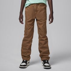 These pants are a modern blend of cargo and workwear pants. They're made of woven cotton canvas, the stretch waistband with drawcord provides a comfy fit and the multiple pockets can be used to stash small items, making these pants great for business casual or streetwear looks. Workwear Pants, Workwear Trousers, Nike Kids, Brown Fashion, Comfy Fits, Woven Cotton, Nike Jordan, Small Items, Cotton Weaving