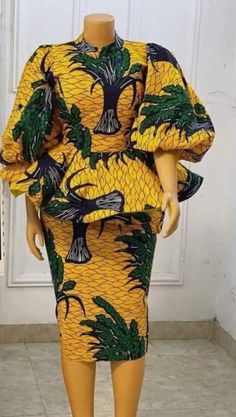 This beautifully made African print outfit will make you look stunning and standout in that your forthcoming occasion. THIS IS A HANDMADE PRODUCT. SO WE WELCOME CUSTOMIZATION. YOU CAN LET US KNOW WHAT YOU WANT TO BE ADDED OR REMOVED FROM THE ORIGINAL STYLE AND EVEN CHOOSE YOUR OWN FABRIC. ABOUT SIZING: *  Comes in different sizes.  * For more perfect fit, please use the measurement guide/sample to measure and send us the following: @Bust @Waist @Hip  @Skirt and top length  Kindly let us know how Green Fitted Printed Skirt, Fitted Green Printed Skirt, Traditional Fitted Yellow Skirt, Yellow Fitted Traditional Skirt, Latest Ankara Skirt And Blouse Styles, Ankara Skirt And Blouse Styles, African Skirt, Ankara Skirt And Blouse, Ankara Dress Styles