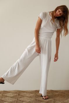 Our best-selling simple pant reimagined in a cropped silhouette. The Pointelle Simple Crop Pant is super-soft, effortless and versatile. Pairs perfectly with The Pointelle Sqaure Neck Tank and The Pointelle Baby Tee Made in LA Cropped Summer Bottoms For Daywear, Cropped Wide Leg Pants For Spring, Elegant Cropped Bottoms For Spring, High-waisted Wide Leg Pants With Elastic Waistband, Spring Cropped Stretch Pants, Spring Cropped Pants With Relaxed Fit, White Cropped Bottoms For Daywear, Chic Cropped Bottoms For Daywear, Elegant Cropped Wide Leg Summer Pants