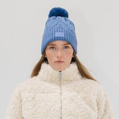 A winter classic. The Ida is a chic cable knit beanie with a classic silicon Gigi Pip label + fluffy faux fur pom in 3 staple colors. This lightweight fold over style is exactly what you need to keep you warm throughout the chilly winter szn, whether your home town is a snowy tundra or even just gets below 50's! Create the ultimate monochromatic winter look by pairing with other popular styles from the Winter Resort Collection HERE! Fall Cable Knit Beanie For Cold Weather, Casual Cable Knit Beanie For Winter, Cozy Cable Knit Winter Beanie, Cozy Cable Knit Beanie For Winter, Cozy Cable Knit Winter Hat, Cold Weather Cable Knit Hat, Winter Cable Knit Beanie One Size, Cozy Cable Knit Beanie For Cold Weather, Winter Cable Knit Beanie