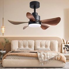 a ceiling fan that is mounted to the side of a bed