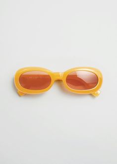 Designed with a wider oval fit for all face shapes and sizes, the Outta Trash sunglasses feature luxurious gold metal hardware on both temples and are made from recycled PET plastic.Fitted with shatterproof and scratch resistant polycarbonate lenses. 60s Vibes, 60s Vibe, Pucci Print, All Face Shapes, Orange Design, Tropical Getaways, Le Specs, Oval Sunglasses, Plastic Animals