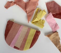 several pieces of fabric are laid out on the table to make origami shapes