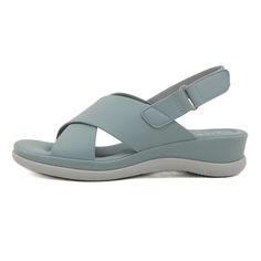 Step into comfort and style with the Siketu Norina Cushioned Slingback Sandal. These sandals feature a cushioned footbed and adjustable slingback strap for a perfect fit. The chic dusty blue color adds a touch of sophistication to any outfit. Elevate your summer footwear game with Siketu. 1.57'' heel Hook & loop velcro closure PU upper Synthetic Arch support footbed™ Cushioned Insole™ Anti-skid rubber sole Dusty Blue Color, Women Wedges, Summer Footwear, Reindeer Headband, Shoes Comfortable, Womens Slides, Daily Dress, Womens Wedges, Dress Jewelry