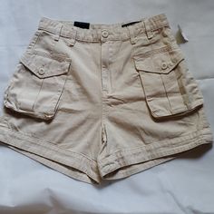 Nwt In Excellent Condition Blank Nyc Khaki Shorts. 4" Inseam 12.5 High Rise 2 Back Pockets Still Seamed Zipper And Button Closure 2 Large Cargo Pockets With Button Closure. 100% Cotton Lightweight Ready For Your Summer Days! Please Feel Free To Message Me With Any Questions. Beige Utility Cargo Style Shorts, High Rise Cotton Cargo Shorts With Side Pockets, High Rise Utility Shorts With Cargo Pockets, Utility High Rise Shorts With Cargo Pockets, Beige Utility Cargo Shorts, High Rise Cotton Cargo Shorts, High Rise Cotton Shorts With Pockets, High Rise Cargo Shorts With Pockets For Spring, Mid-rise Cotton Shorts With Pockets