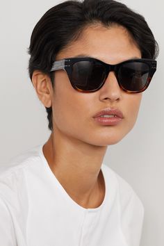 Dior Eyewear's sunglasses are designed with square frames that are softly rounded at the edges. Detailed with logo lettering at the wide arms, they're made from a combination of black and tortoiseshell acetate. Dior Sunglasses Women, Dior Eyewear, Urban Outfitters Sunglasses, Dior Sunglasses, Butterfly Sunglasses, Acetate Sunglasses, Eyewear Womens, Black Square, Black Sunglasses