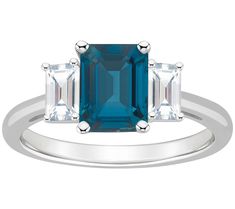 Make a statement with this gleaming ring flaunting an array of topaz gems that turn heads with every gesture. From Affinity Gems. Multi Gemstone Ring, 3 Stone Rings, Three Stone Rings, London Blue Topaz, London Blue, White Topaz, Three Stone, Gemstone Ring, Emerald Cut