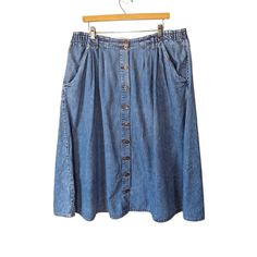 Classic Midi A-Line Button Up Jean Skirt by Bill Blass. Era: late 1980s early 1990s Fabric: 100% Stone Washed Cotton Denim Features: High waist with double button closure. Functional buttons all the way up the front. Falls on an A-line mid-calf. Size: tag size 16. Please check the measurements for fit: Across the waist flat: 20" (40" around) Across the hips flat: 29" (58" around) Total length: 31" Condition: Good. There are a few minor discolorations on the front. See pics. Awesome skirt. Cheap Medium Wash Button-up Denim Skirt, Cheap Blue Button-up Denim Skirt, Cheap Button-up Denim Skirt With Pockets, Cheap Denim Skirt With Buttons, Cheap Medium Wash Skirt With Button Closure, Bill Blass, Skirt Women, All The Way Up, Jeans Rock