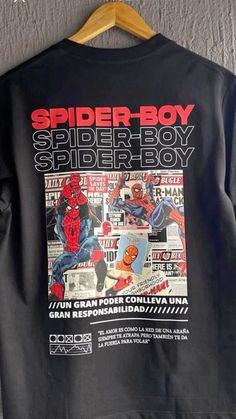 a spider - boy shirt hanging on a wall with the words spider - boy in it