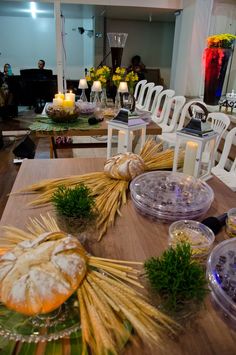 a wooden table topped with lots of food