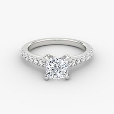 a princess cut diamond engagement ring with side stones