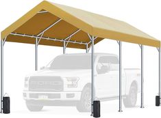 a white truck parked under a yellow awning