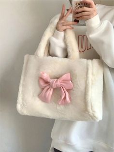 White Sweet Bow Plush Handbag Details: Handbags Type: Shoulder Bags Types of bags: SHOULDER BAGS Main Material: POLYESTER Lining Material: POLYESTER Shape: Casual Tote Hardness: SOFT Pattern Type: Solid Interior: Interior Slot Pocket Decoration: Appliques Decoration: BOW Exterior: Silt Pocket Occasion: Versatile Closure Type: hasp Gender: Female Style: Japan Style Model Number: FQ204 Number of Handles/Straps: Single Aesthetic Plush, Bow Tote Bag, Harajuku Aesthetic, My Style Bags, Soft Pattern, White Shoulder Bag, Plush Bags, Girly Bags, Girly Accessories