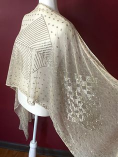 "This 1920's Egyptian wedding shawl is simply delightful. It is super soft, so sensual...the way it drapes and looks on the body is simply stunning. The silver is bright with nine filled diamonds, three large ones, and the center is filled with beautiful trees. It also has chevron borders and long rows of vines on each end. Coming in at 82 inches long and 22 wide, perfect for wearing! NO HOLES or tears, excellent condition with a small mark (pictured) This amazing piece of wearable art is 100 ye Elegant Traditional Drape Shawl For Celebration, Fitted Elegant Shawl For Festive Occasions, Fitted Vintage Shawl For Wedding, Elegant Fitted Festive Shawl, Elegant Fitted Shawl Dupatta, Elegant Fitted Silver Dupatta, Vintage Wedding Dupatta In Traditional Drape, Vintage Wedding Dupatta With Traditional Drape, Fitted Shawl For Wedding And Festive Occasions