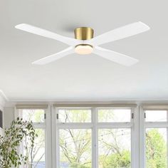 a white ceiling fan in a living room