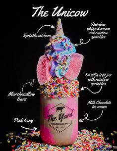 the unicorn cupcake is decorated with sprinkles