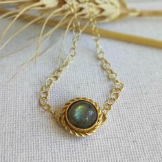 A natural Labradorite bracelet, a window to your inner worlds. This unique gemstone, with its mystical shimmer, connects you with your intuition and grants you spiritual powers.  The perfect Jewelry to complete any look, add a touch of magic to any outfit. Each bracelet is a one-of-a-kind piece, handcrafted with high-quality gold plating. Labradorite is a stone of protection, connection, and empowerment, and will accompany you on your journey. The stone house in the bracelet is handmade and inside it is placed a stunning labradorite stone with a delicate and special color. A delicate chain of loops is attached to the stone house for convenient closure according to the length of the bracelet that suits you personally. Natural gemstone in an 18k gold plated charm on an adjustable chain. DIME Labradorite Bracelet, Spiritual Power, Stone House, Unique Gemstones, Labradorite Stone, Gold Plating, Precious Stones, Handmade Natural, Labradorite