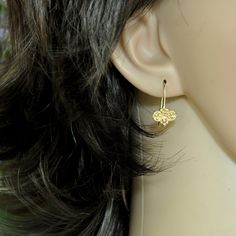 "Unique Indian style, 14K gold earrings, with a Diamond or Zircon stone. If you like the gentle look, these earrings are perfect for you. You can wear them and never take them off:- If you look for unique bridle earrings - am sure these are for you, you can wear them in your wedding with or without a gentle necklace and feel special. The Diamond set in the middle of the earring between the gold dots. These small dots give the earring an Indian look, like a granulation Indian work. There is a hoo Gold Teardrop Cluster Earrings For Anniversary, Gold Diamond Earrings With Ear Wire, Gold Plated Lever Back Earrings For Anniversary, Delicate Gold Diamond Earrings For Formal Occasions, Gold 14k Diamond Earrings With Elegant Design, Yellow Gold Teardrop Cluster Earrings For Gift, Delicate Yellow Gold Earrings For Anniversary, Gold Dangle Cluster Earrings Fine Jewelry, Yellow Gold Dangle Cluster Earrings For Anniversary