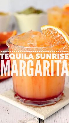 tequila sunrise margarita with orange slices and garnish