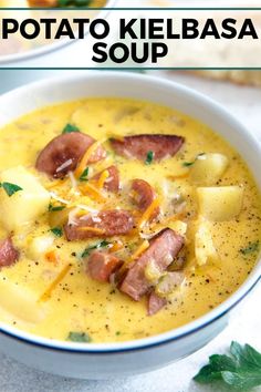 two bowls filled with potato kielbasa soup