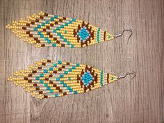 Traditional Beaded Fringe Earrings For Festival, Traditional Beaded Earrings With Fringe For Festivals, Southwestern Beaded Earrings With Tassels For Festival, Bohemian Turquoise Tassel Earrings With Colorful Beads, Bohemian Latkans Earrings For Beach, Bohemian Beaded Latkan Earrings For Beach, Bohemian Yellow Beaded Dangle Earrings, Festival Fringe Earrings With Round Beads, Bohemian Beaded Latkans Earrings For Beach