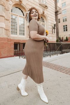 The perfect addition to your fall wardrobe is here - the Alexa Dress in Taupe! Made from a soft and comfortable taupe knit fabric, this modest women's dress features a round neckline and short fitted sleeves. The midi-length skirt and pull-over style make it both stylish and easy to wear. Plus, it's maternity friendly! Brown Knit Dress, Fall Neutrals, City Woman, Chic Fall Outfits, Fitted Sleeves, Fall Photoshoot, Layering Outfits, Midi Length Skirts, City Chic