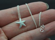 **Made of  925 sterling silver - safe for those with an allergy. Necklace and starfish are made of 925 sterling silverWith Stamp S925 Pendant Size(including the ring on top): 13mmNecklace: 18 inches  These are ready to ship and will arrive in a box, ready for gifting, or to keep for yourself. Silver Jewelry With Starfish Charm For The Beach, Sterling Silver Starfish Charm Pendant Necklace, Sterling Silver Pendant Necklace With Starfish Charm, Ocean-inspired Silver Necklace With Star Charm, Sterling Silver Starfish Charm Necklace, Silver Starfish Necklace For Gift, Ocean-inspired Sterling Silver Charm Necklaces, Ocean-inspired Sterling Silver Jewelry With Starfish Charm, Ocean-inspired Silver Sterling Charm Necklaces