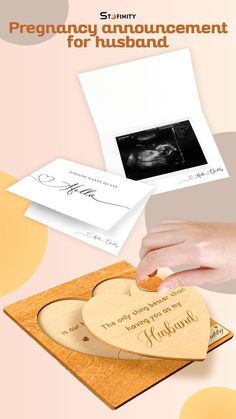 a wooden heart with the words pregnant on it and an image of a baby's birth