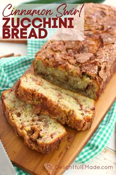 a loaf of cinnamon swirl zucchini bread on a cutting board