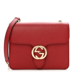 This is an authentic GUCCI Dollar Calfskin Small Interlocking G Shoulder Bag in Red.This chic shoulder bag is crafted of beautifully grainedcalfskin leather in red. The bag features a polished light gold chain-linkshoulder strap with a leather shoulder pad and a matching gold interlocking G flip-lock on the crossover flap. This opens the bag to a partitioned beige fabric interior with a patch pocket. Soho Disco Bag, Gucci Crossbody Bag, Small Messenger Bag, Gucci Crossbody, Gucci Monogram, Vintage Monogram, Gucci Shoulder Bag, Beige Fabric, Bag Light