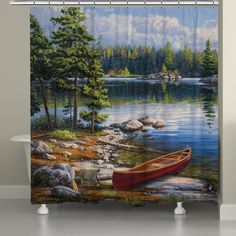 a shower curtain with a painting of a boat on the water and trees in the background