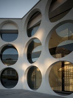 a building that has many circular windows on it