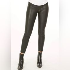 Chic 4-Way Stretch Vegan Leather Leggings Come Equipped With Seamed Details. These High Waisted Leggings Fit The Contours Of Your Body Like A Glove. Fitted Mid-rise Leather Pants For Spring, Sleek Fitted Bottoms For Fall, Sleek Spring Leggings, Sleek Tight Pants For Spring, Chic Full-length Leggings, Chic Full Length Leggings, Chic Mid-rise Winter Bottoms, Chic Tight Trousers Pants, Fitted Full-length Leather Pants For Spring