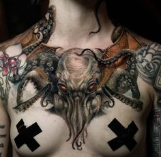 an octopus with cross tattoos on his chest