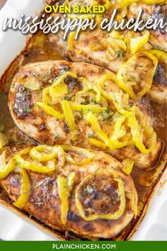 chicken with yellow peppers and onions in a casserole dish on a white plate