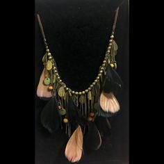 Bohemian Vibes Black And Tannish Beige Feathers Dark Gold Color Chain Tassels Beads Brown Faux Suede Cord Statement Necklace Lobster Clasp Approximately 24 Inches, 2 Inch Extension From Smoke-Free And Pet-Free Home Bohemian Adjustable Tassel Necklace With Fringe, Bohemian Fringe Necklace, Brown Tassel Necklace For Festival, Adjustable Dangle Tassel Necklace For Festivals, Adjustable Bohemian Necklaces With Feathers, Adjustable Bohemian Tassel Necklace With Beaded Fringe, Brown Tassel Jewelry For Festivals, Bohemian Tassel Necklace With Beaded Fringe, Bohemian Beaded Fringe Necklace