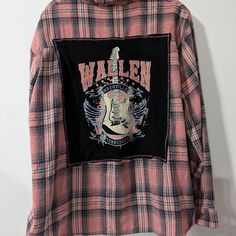 Morgan Wallen Plaid Flannel Shirt Hand Crafted Upcycled Button Front Shirt With Vintage T-Shirt Handmade Upcycled Design Sustainable Repurposed Hand Crafted To Make This Fabulous One Of A Kind Tee Shacket! Size 1xl Boutique New *See Photos For Measurements! W 26" L 29" Our Sustainable Design Pieces Are Quality Sewn With Custom Stitching To Last Longer And Hemmed (So No Raw Edges Or Fraying) To Look Finer! We Match Graphics From Vintage Tees And Pair Them With Premium Vintage Shirts And Jackets T Alter Clothing, Morgan Wallen, Plaid Flannel Shirt, Handmade Furniture, Button Front Shirt, Jacket Buttons, Sustainable Design, Plaid Flannel, Crocheted Item