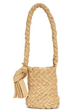 The Italian label's signature intrecciato weave becomes even more textural on this compact bucket bag crafted from strips of pleated calfskin leather. The covetable style is topped with a braided strap secured with an oversized knot. 6"W x 8.5"H x 5"D Open top Shoulder strap Removable drawstring lining Leather Made in Italy Designer Handbags Adjustable Bag, Drawstring Bucket Bag, Bottega Veneta Intrecciato, Woman Bags Handbags, Braided Strap, Leather Bucket Bag, Leather Bucket, Open Top, Bottega Veneta