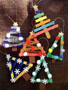 popsicle christmas tree ornament made from popsicle sticks and colored construction paper