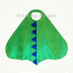 a green and blue bib with an arrow on the side, sitting in front of a white background