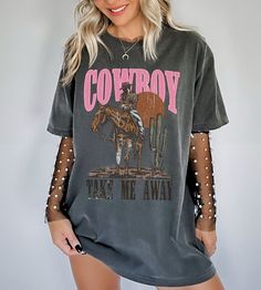 Show off your cowgirl aesthetic in our latest cowboy take me away shirt. This trendy western graphic tee is slightly disressed and oversized, perfect for a country music concert outfit. * Ultra soft * Distressed design * Pre-shrunk * Universal fit * True to size * DTG Printing * Color - Comfort Colors Refunds/Exchanges: * No Cancellations * No returns/exchanges * All sales are final Sizing: Our graphic tees and sweatshirts are a true to size standard unisex fit. For an oversized look, please siz Country Concert T Shirt Dress, T Shirt Dress Western Outfit, Country Rap Concert Outfits, Country Concert Outfit Ideas Midsize, Oversized Western Shirt Outfit, Brantley Gilbert Concert Outfit, Western Graphic Tees Outfit, Cute Concert Outfit Ideas, Cody Johnson Concert Outfit